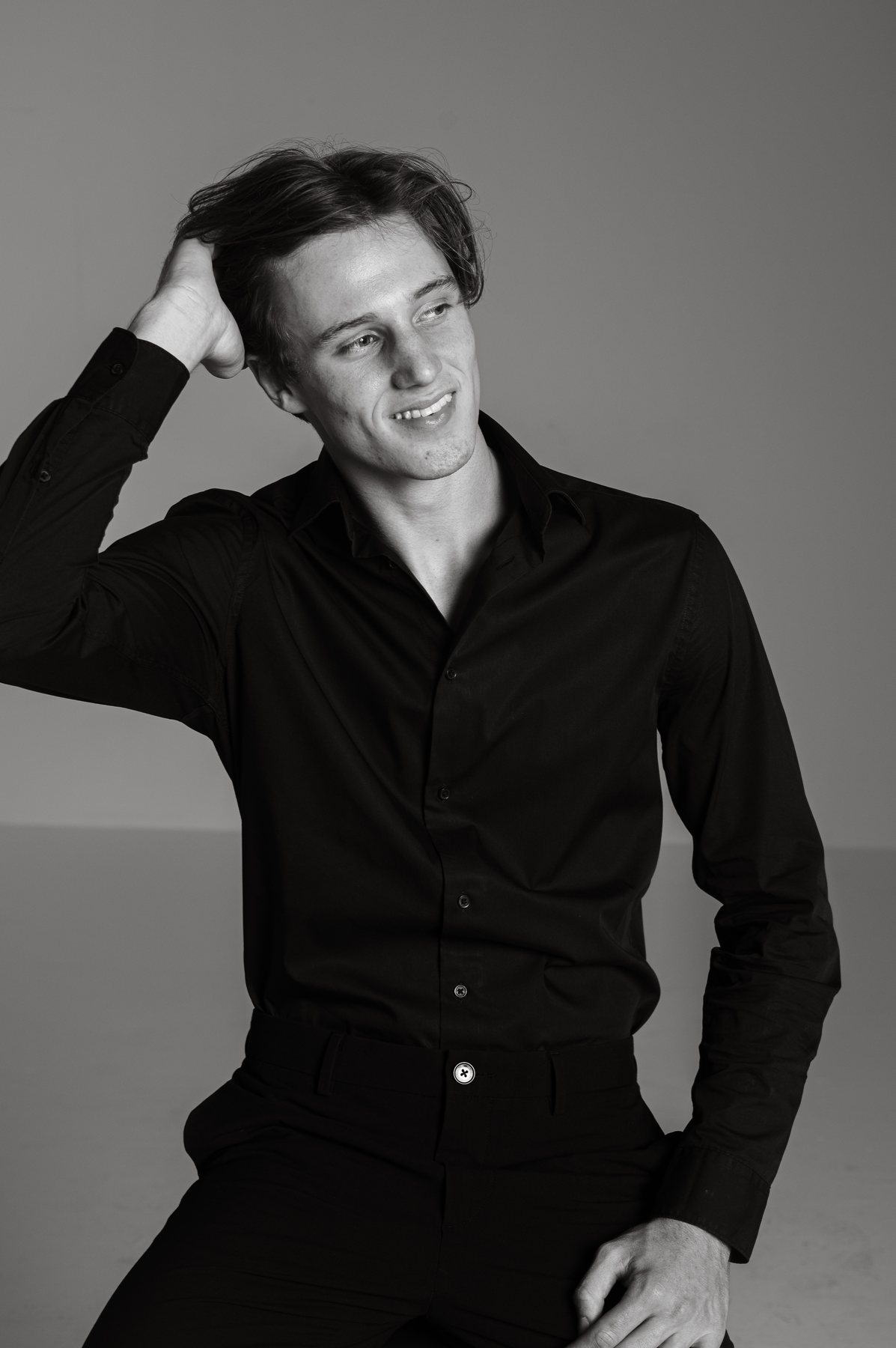 Bastian Gandy, black shirt portrait