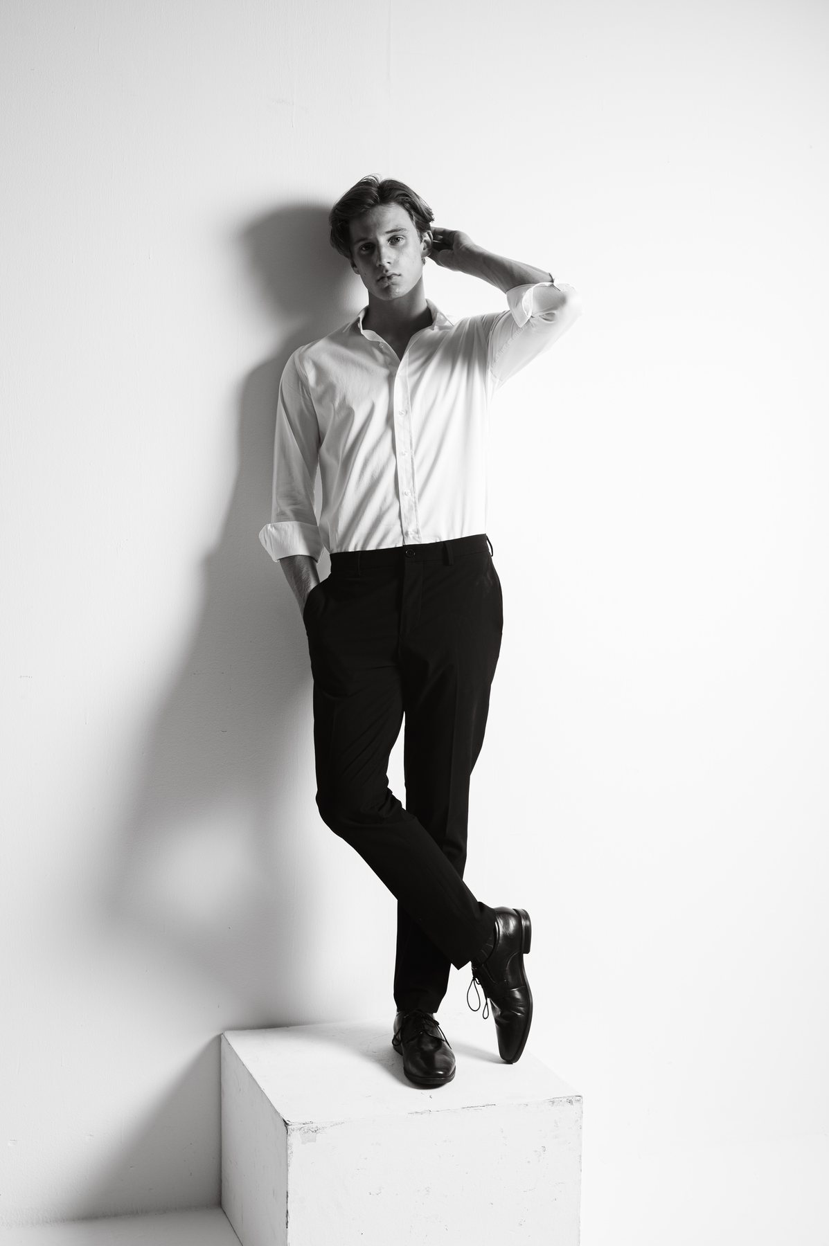 Bastian Gandy, standing portrait, white shirt